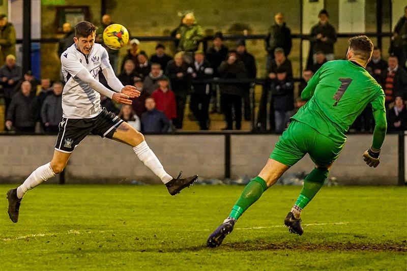 Toby blasts a header past the goalkeeper in scoring the Whites’ second goal at the Ray Mac against Chesham United on 4 January in an impressive 3-2 victory. Happy New Year everyone!